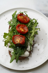 Traditional italian bruschetta with roasted tomatoes