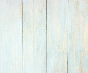 Old blue and grey wooden background with cracks and scratches in vintage style