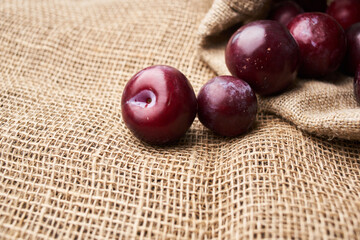 plums fruits natural products on a wooden table top view