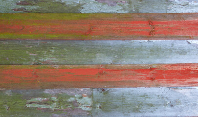 Old grey and brown wooden background with cracks and scratches in vintage style