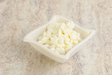Grained cottage cheese in the bowl