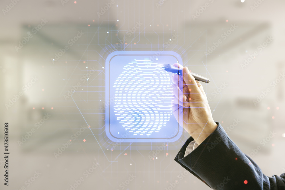 Poster man hand with pen working with abstract virtual fingerprint hologram on blurred office background. m