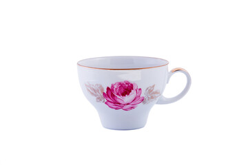 Ceramic vintage white cup with floral ornament isolated on white background. Copy space.