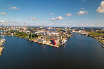 Fototapeta premium Gdansk. A city by the Baltic Sea on a sunny beautiful day. Aerial view over the seaside city of Gdańsk.