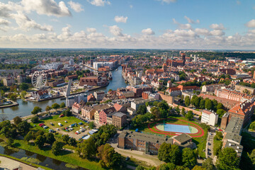 Fototapeta na wymiar Gdansk. A city by the Baltic Sea on a sunny beautiful day. Aerial view over the seaside city of Gdańsk.
