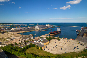 Gdynia city by the sea on a sunny day from a drone. Summer colors and sun rays in Gdynia.