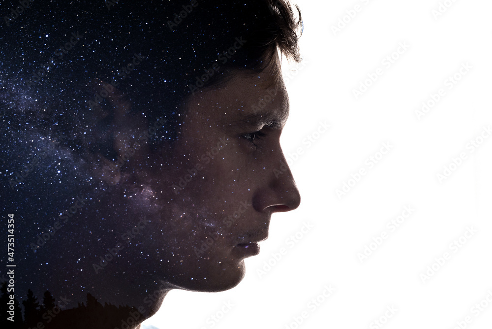 Sticker combination of the silhouette of a man face and space with stars. concept of the connection between 