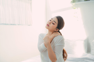 Beautiful asian woman in bedroom morning portrait