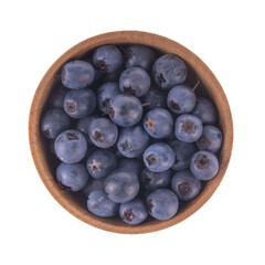 blueberries in wooden cup isolated on white background. top view