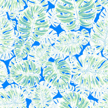 Watercolor seamless pattern with tropical leaves. Beautiful allover print with hand drawn exotic plants. Swimwear botanical design. © Natallia Novik