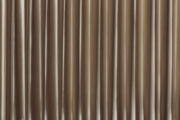Obraz premium background photo of metalic golden color curtain in the luxury bedroom of the luxurious hotel before cleaning process for available booking