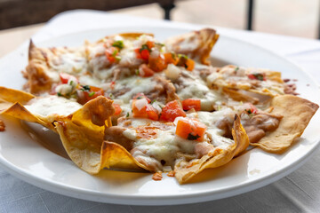Plate of Nachos with Beans and Cheese