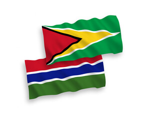 Flags of Co-operative Republic of Guyana and Republic of Gambia on a white background