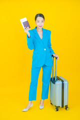 Portrait beautiful young asian woman with luggage bag and passport