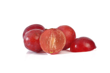 Red grape with leaf isolated on white background