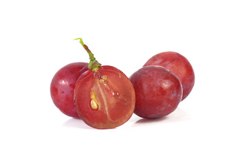 Red grape with leaf isolated on white background