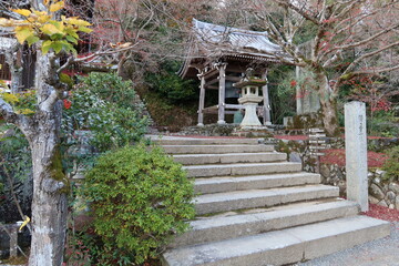 Shiawaseno-kame Shourou Belfry and autumn leaves in the precincts of Nison-in Temple at Saga in Kyoto City in Japan 日本の京都市嵯峨にある二尊院境内のしあわせの鐘と紅葉