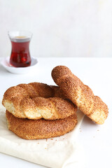 Sesame bagel on a white background. Turkish breakfast. vertical view. close up