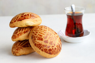 Turkish pastry product , tasty pogaca. Turkish Pastries on a white background. horizontal view. close up. Turkish breakfast.