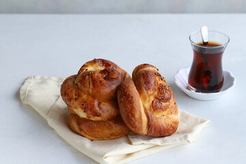 Turkish pastry product , tasty pogaca. Turkish Pastries on a white background. horizontal view. close up. Turkish breakfast.