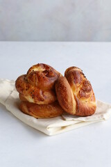 Turkish pastry product , tasty pogaca. Turkish Pastries on a white background. Vertical view. close up. Turkish breakfast.