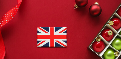 British Christmas tradition and holiday design concept. Union Jack flag of Great Britain and xmas...