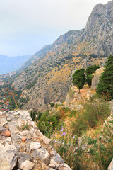 Fototapeta na wymiar Ancient austrian road to castle in the mountains near Kotor, Montenegro