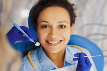 Woman looking at camera during dental procedure