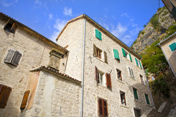 Fototapeta na wymiar Historic houses in Old Town in Kotor, Montenegro
