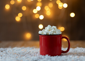 cup of marshmallows with christmas decorations