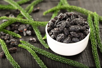 Bowl of healthy and delicious sun dried black grapes,, raisins, 