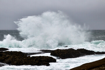 waves crashing on rocks