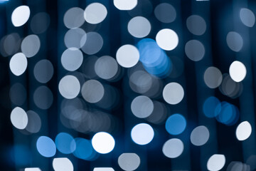 Background in the form of a bokeh of blue color, a lot of New Year's bokeh