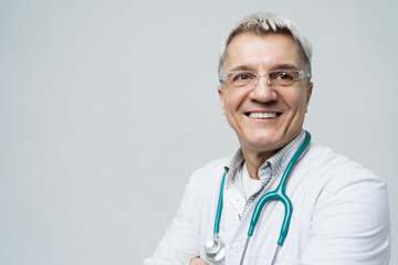 Age male doctor portrait with glasses