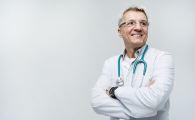 Fototapeta premium Age male doctor portrait with glasses positive