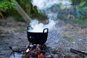 Cooking pot on a wood stove in the Asian countryside