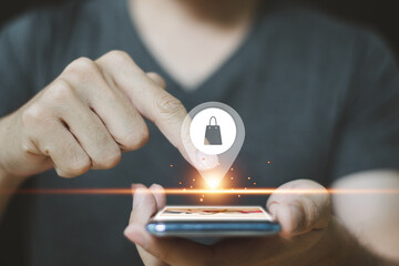 Businessman searching for a store on a smartphone to buy products, comfortable life concept New technology and routine