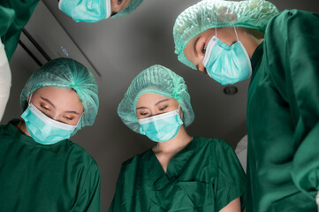 Fototapeta na wymiar professional surgeon doctor team are working for surgery in medical operating room at hospital