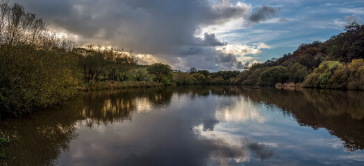 Panoramic view of Lake in Kenwith valley local nature reserve aka LNR, and community park. Photo taken November in Bideford, Devon.
