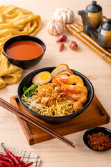 Hokkien mee or Prawn noodle are tossed in pork lard and served with fish balls, shrimp.

Hokkien mee is a Southeast Asian dish that has its origins in the cuisine of China's Fujian (Hokkien) province