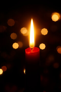 Close up of burning Christmas candle