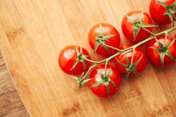 cherry tomatoes on a branch fresh food ingredients for salad