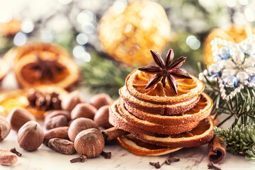 Fototapeta na wymiar Dried orange in the shape of a Christmas tree and star anise on top