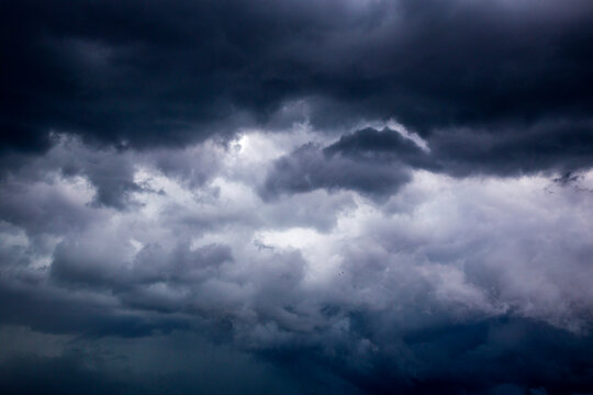 Cloudscape of gray storm clouds in summer