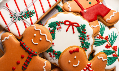 Christmas composition with decorations and cookies on a mint background
