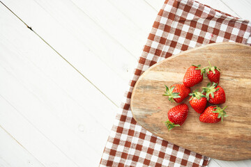 fresh strawberries on wooden board fruit vitamins summer