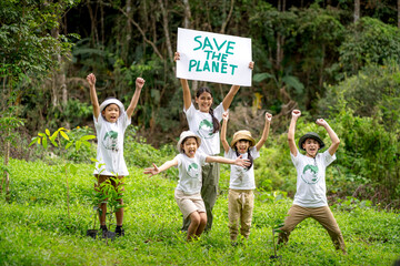 Children join as volunteers for reforestation, earth conservation activities to instill in children a sense of patience and sacrifice, doing good deeds and loving nature. - obrazy, fototapety, plakaty