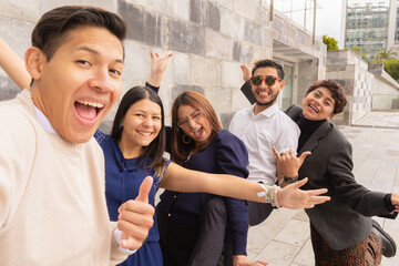 Coworkers leaving the office chatting together.
