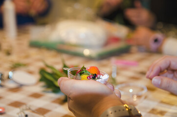 Close up hand working in christmas sphere