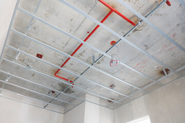 Metal ceiling grid, Acoustical ceiling grid system in the construction site before finishing